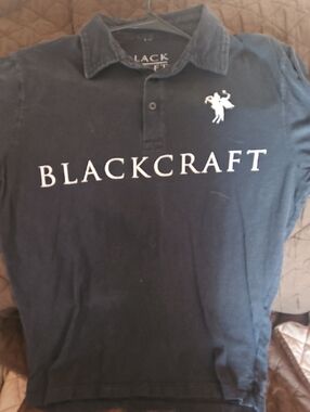 Blackcraft Cult Black Polo Shirt with White Logo